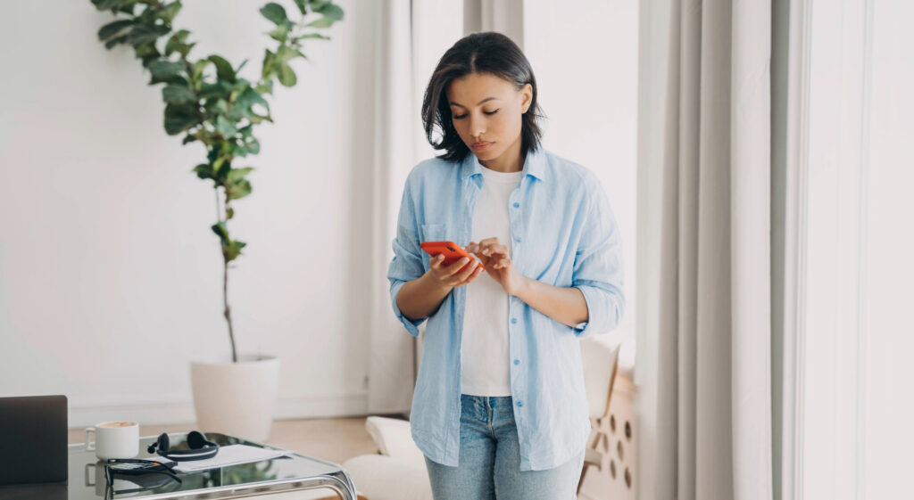 woman holding smartphone