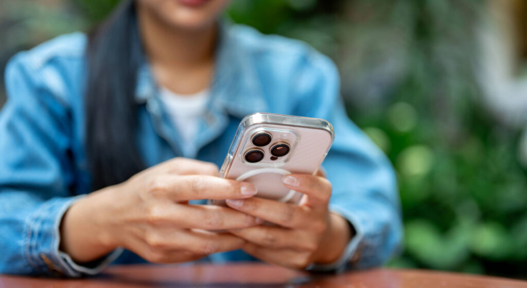 woman using iphone