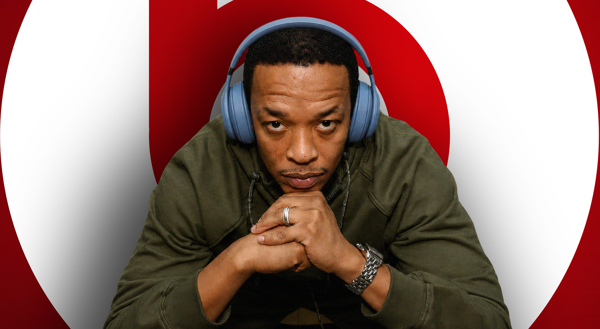 Dr.Dre wearing a beats' headphone